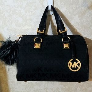 Nwot MK Canvas black & gold Satchel w/ charm.